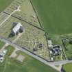 Oblique aerial view of Old Pitsligo Church and Churchyard and Hill Church of Rosehearty, looking E.