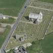 Oblique aerial view of Old Pitsligo Church and Churchyard and Hill Church of Rosehearty, looking NNE.