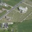 Oblique aerial view of Old Pitsligo Church and Churchyard and Hill Church of Rosehearty, looking N.