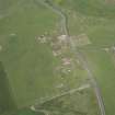 Oblique aerial view of Tershinty Camp on the former site of Fraserburgh Airfield, looking NW.