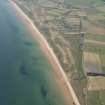 Oblique aerial view of Brora Golf Course, looking SW.