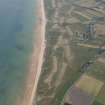 Oblique aerial view of Brora Golf Course, looking S.