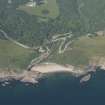 Oblique aerial view of Berriedale Village and harbour and Berriedale Braes, looking NW.