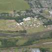 Oblique aerial view of the 2013 Caithness County Show at the Riverside and Westerseat Grounds, North Footbridge and Wick Old Parish Church, looking NNE.