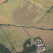 Oblique aerial view of the cropmarks of the cursus, barrows, enclosure, ring ditches and rig, looking ESE.