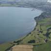General oblique aerial view of Stranraer Golf Course with the town beyond, looking SE.