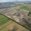 Oblique aerial view of the Diageo bonded warehouses at Cluny Bond under construction with Kirkcaldy beyond, looking SSW.