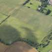 Oblique aerial view of the cropmarks of the settlement, looking SW.