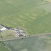 Oblique aerial view of the cropmarks of the settlement features at Howe Mire, looking S.