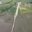 Oblique aerial view of Evanton airfield, looking WSW.