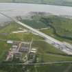 Oblique aerial view of Evanton airfield, looking SSE.