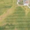 Oblique aerial view of the cropmarks of the possible unenclosed settlement, looking NE.