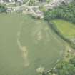 Oblique aerial view of the cropmarks of the possible enclosure, looking N.