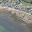 Oblique aerial view of a fish trap at Golspie, looking NW.