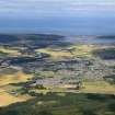 General oblique aerial view centred on Forres with Findhorn Bay beyond, looking N.