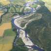 General oblique aerial view centred on the River Spey with Spey Viaduct beyond, looking N.