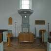 View of chancel with font, pulpit and lectern