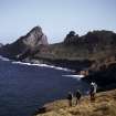 Photograph from Ruaival looking towards Dun with H Smith, M P Harris, M Roberts, April 1974.