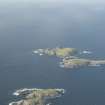 General oblique aerial view of Soraigh with Eilean Mor and Eilean Tighe beyond, looking to the N.
