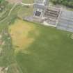 Oblique aerial view of the remains of the windmill at Sandend, looking E.