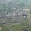General oblique aerial view centred on the T in the Park festival at Balado, looking SW.