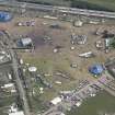 Oblique aerial view of the T in the Park festival at Balado, looking SSE.