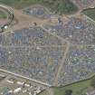 Oblique aerial view of the T in the Park festival at Balado, looking NNE.