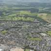 General oblique aerial view of Inverurie with the golf course beyond, looking to the SW.