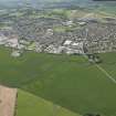 General oblique aerial view of Inverurie with the golf course beyond, looking to the SSW.