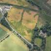 Oblique aerial view centred on the cropmarks at Gilrivie, looking SE.