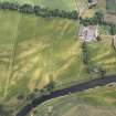 Oblique aerial view of the cropmarks at Balmakewan, looking ENE.