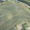 Oblique aerial view of the cropmarks at 'Montgomery's Knap', looking S.