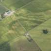 Oblique aerial view centred on the enclosure at Battledykes, looking NE.