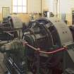 Ground floor, rotary converters nos 1 and 2 (nearest camera). No.2 Converter parts Left to right: rotor oscillater, bearing, brushes, converter body (within casing with makers mark - Metropolitan Vickers Electrical Co. Ltd, Manchester & Sheffield, England Rotary Converter 500kW, 500/540DC Volts 963 amps, 6PH, 50 per 1000 RPM, Serial number P66259), slip ring, bearing, exciter. Cable pit 1.1m deep.