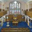 Interior. General view of gallery to pulpit area.