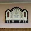 Interior. Detail of memorial to Randolph Stewart.