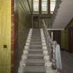 Interior view of staircase in the ground floor entrance hall at Craigie Hall, Rowan Road, Glasgow.