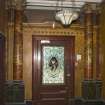 Ground floor, entrance hall, front door, columns and ceiling light fitting, view from south