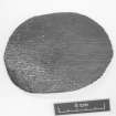 Wooden disk with stamped or branded mark (DP99/020). Scale 5 centimetres. (Colin Martin)