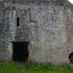 The rear SE face of the main kiln building showing structural features indicative of a bridge linking its upper level with Kiln A. Scale 2 metres. (Colin Martin)