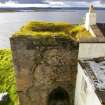 View from the top of Kiln B towards Kiln A, showing its relationship with the adjoining cottage. This is where the putative bridge would have crossed. (Colin Martin)