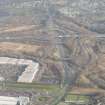 Oblique aerial view of the Low Parks area of Hamilton with Junction 6 of the M74 beyond, looking to the NE.