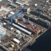 Oblique aerial view of Rosyth Dockyard showing the construction of the new aircraft carrier, HMS Queen Elizabeth, looking NNE.