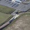 Oblique aerial view of the Edinburgh Tramway at Edinburgh Airport, looking SSE.