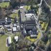Oblique aerial view of Queen Victoria School, looking SW.