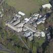 Oblique aerial view of Queen Victoria School, looking NNE.
