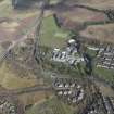 Oblique aerial view of Queen Victoria School, looking NE.