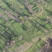 Oblique aerial view centred on part of the disused race course, the farmstead and the golf course, looking ESE.