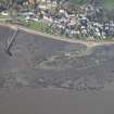 Oblique aerial view of the pier and harbour at Culross, looking NNW.