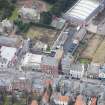 Oblique aerial view of the former New Inn barracks, looking SE.